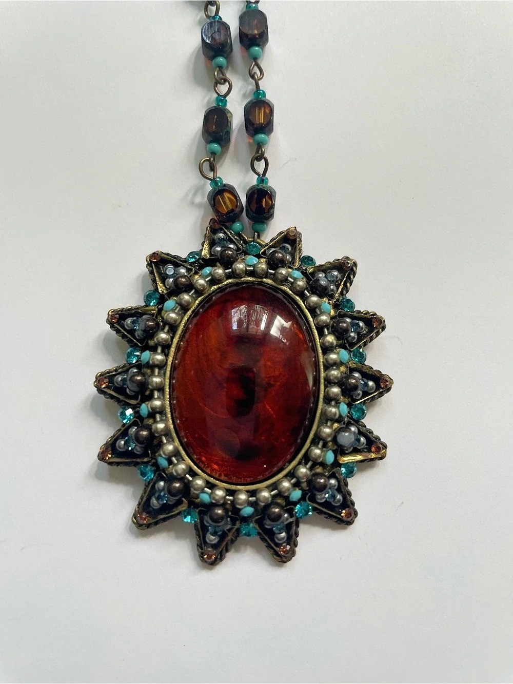 F.A.I.T.H Sunburst Pendant Beaded Necklace in Brown & Blue